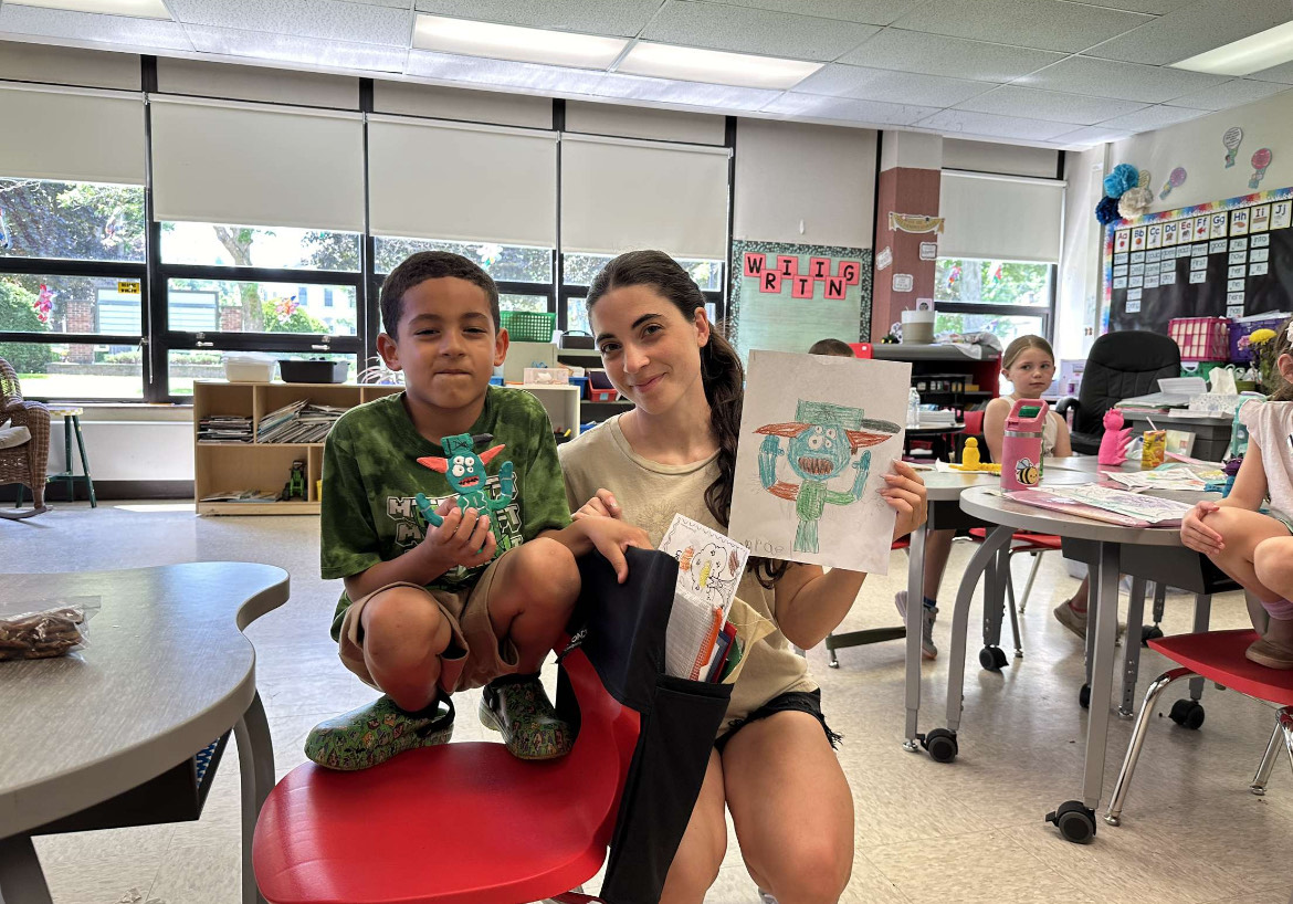 Ceramics III and 1st grade students collaborate on monster art. May 2024.