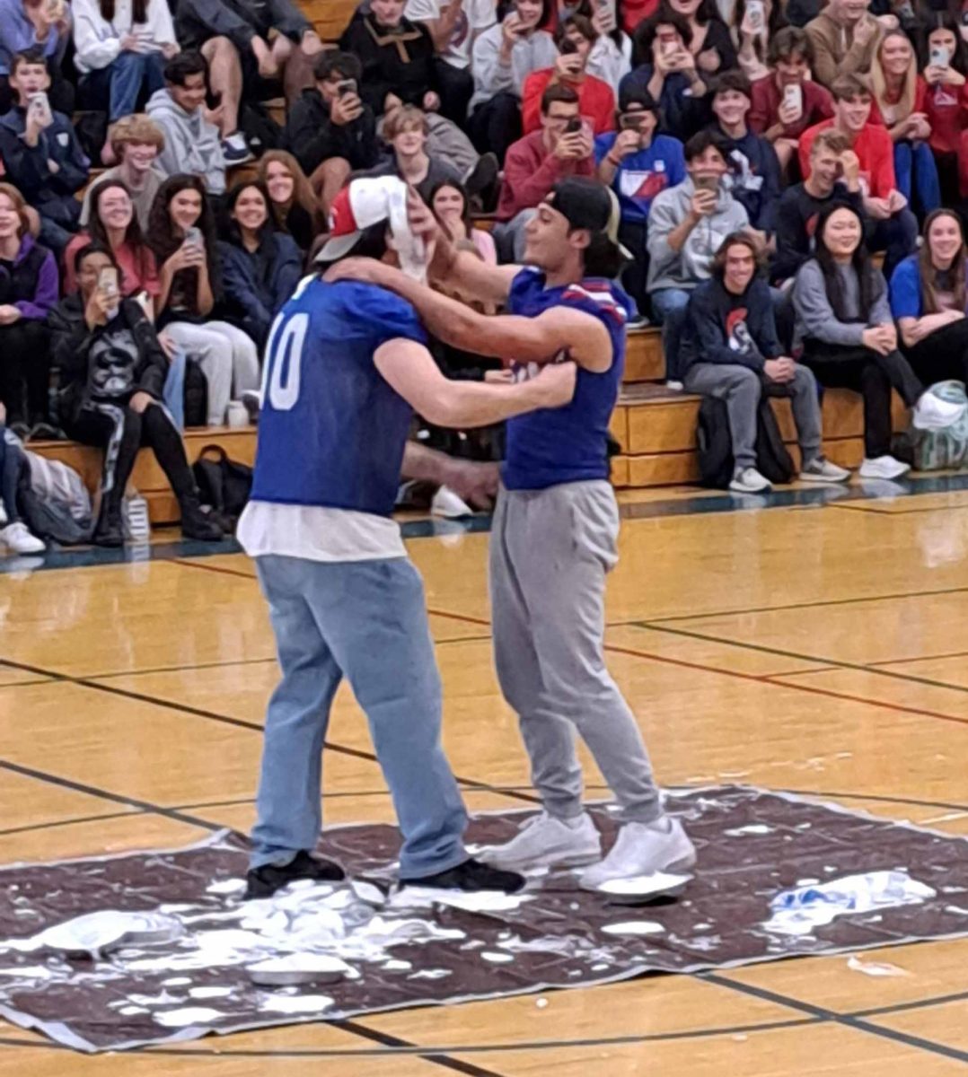 Tommy Vitagliano shows his appreciation for Mr. Ryan with a pie in the face at the pep rally.  Fall 2023.