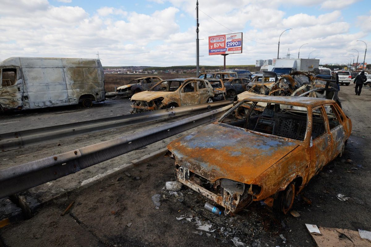 Wreckage of cars abandoned by civilians who tried to escape from Bucha during Russian invasion in February of 2022.  Public Domain. CCO. https://www.flickr.com/photos/president_of_ukraine/51988429685/ 
