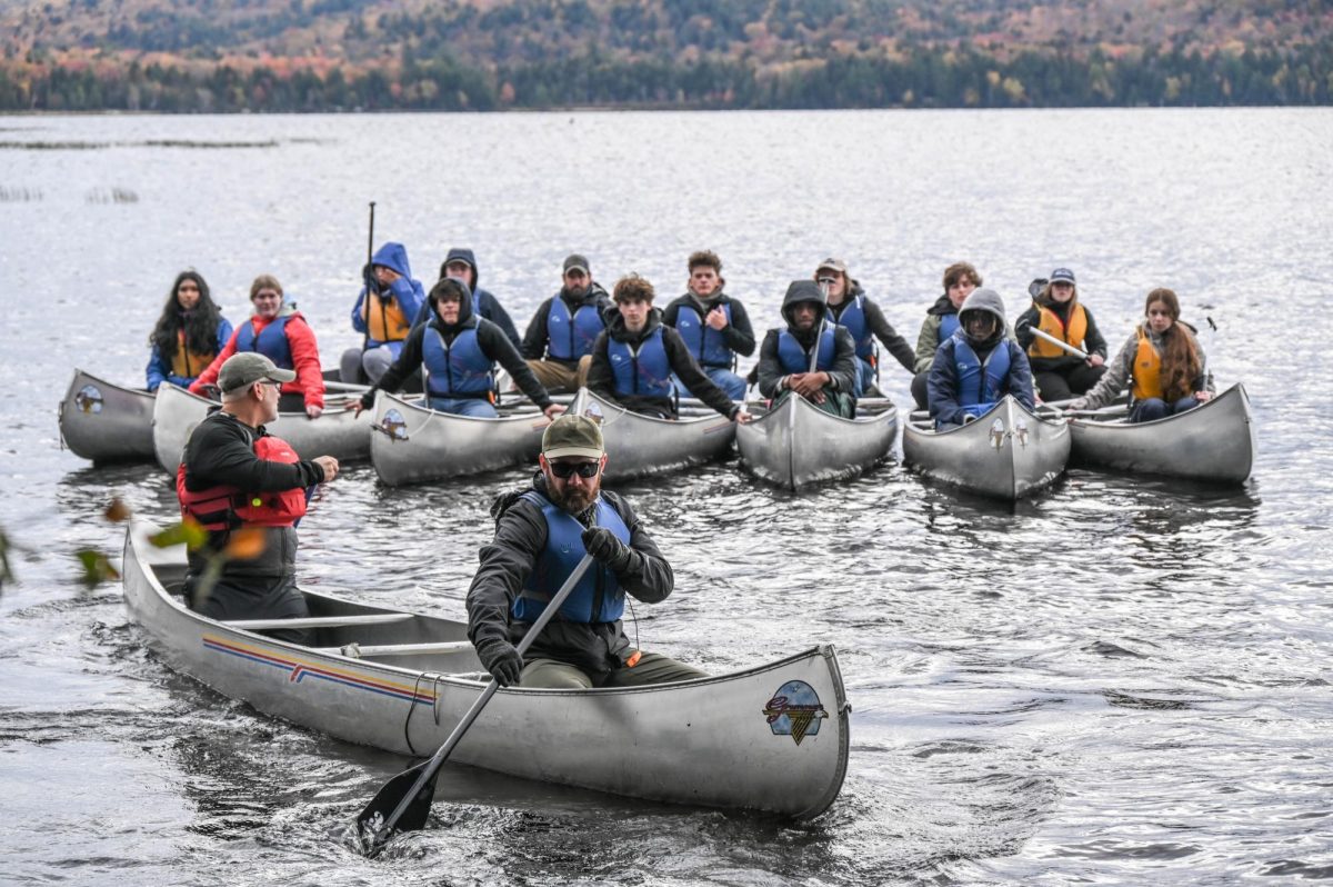 Students using kayaks during the Racquette Lake.