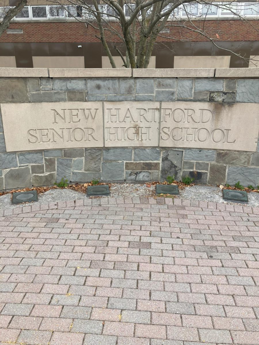 The sign at New Hartford High School welcomes students.