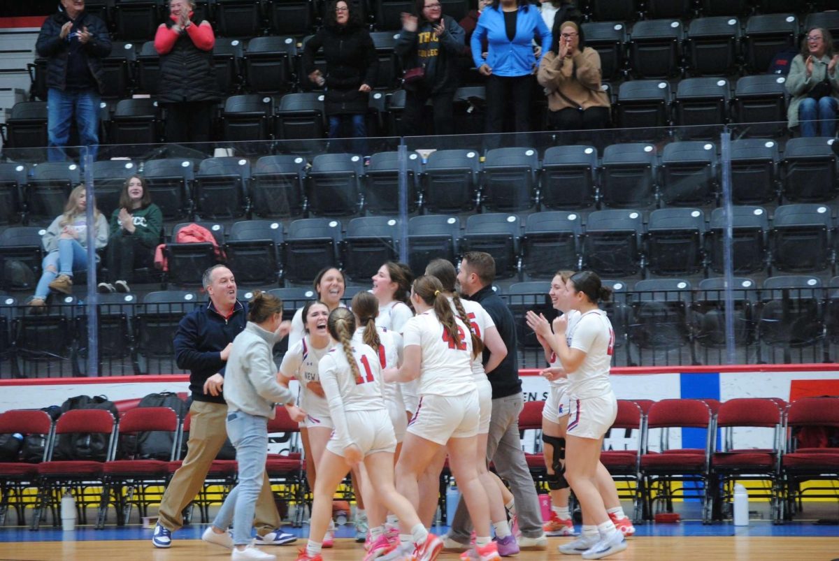 New Hartford Girls Varsity Basketball Team Celebrates after Danielle Lucas scores a 3-pointer at the buzzer for a big win against Ludden!