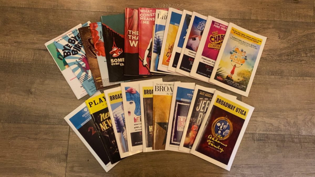 Photo of multiple playbills from shows and musicals. 