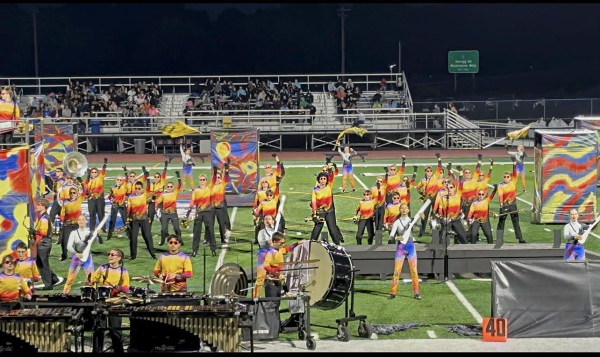 New Hartford Marching band performing during Spartan spectacular 