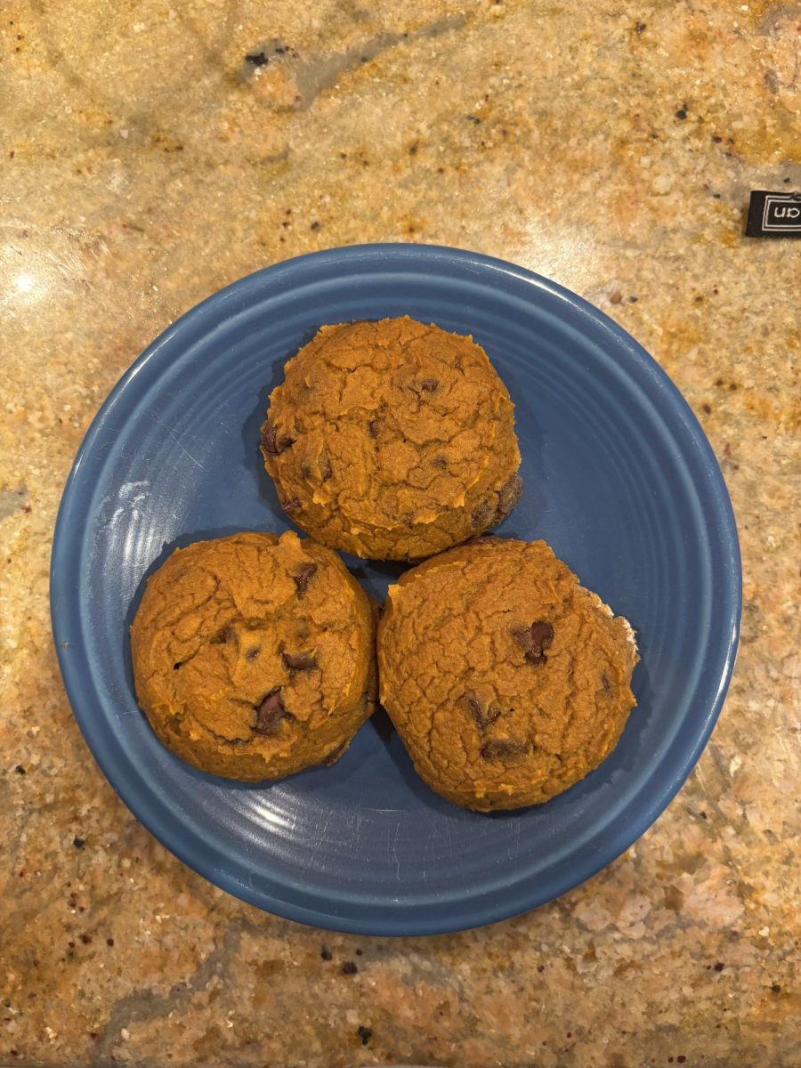 Three pumpkin cookies made out of three simple ingredients, a perfect fall treat!