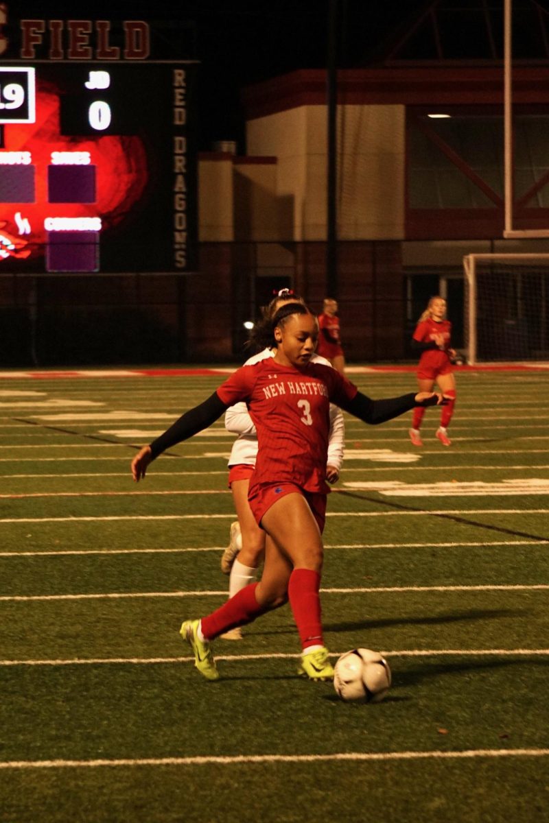 Raiyah Patterson(sophomore) dribbles past defenders. The Girls Varsity Soccer team defeated Jamesville-Dewitt to win the section title on November 2, 2025. The team extends their winning streak to five consecutive section titles.