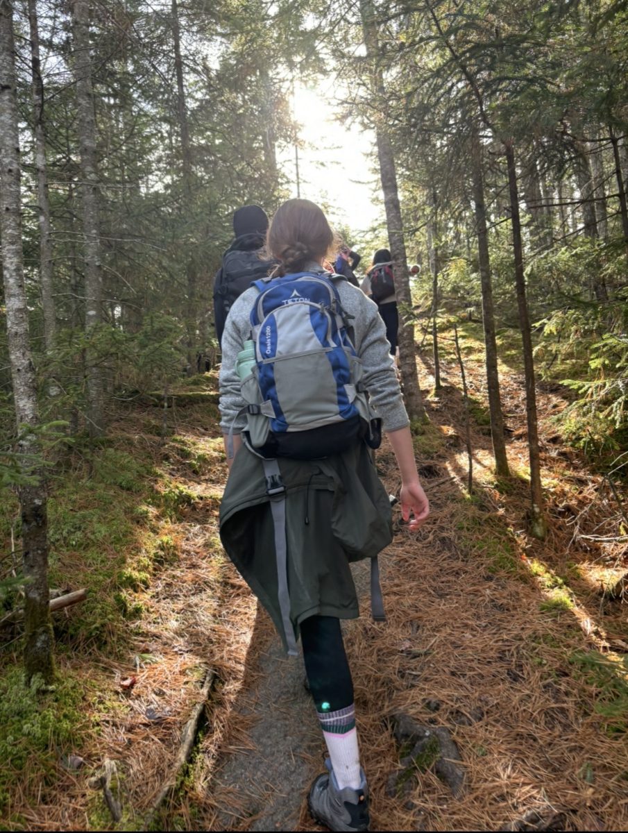 2024-2025 Ecology Club President Hiking Black Bear Mountain in November of 2024 with the Ecology Club