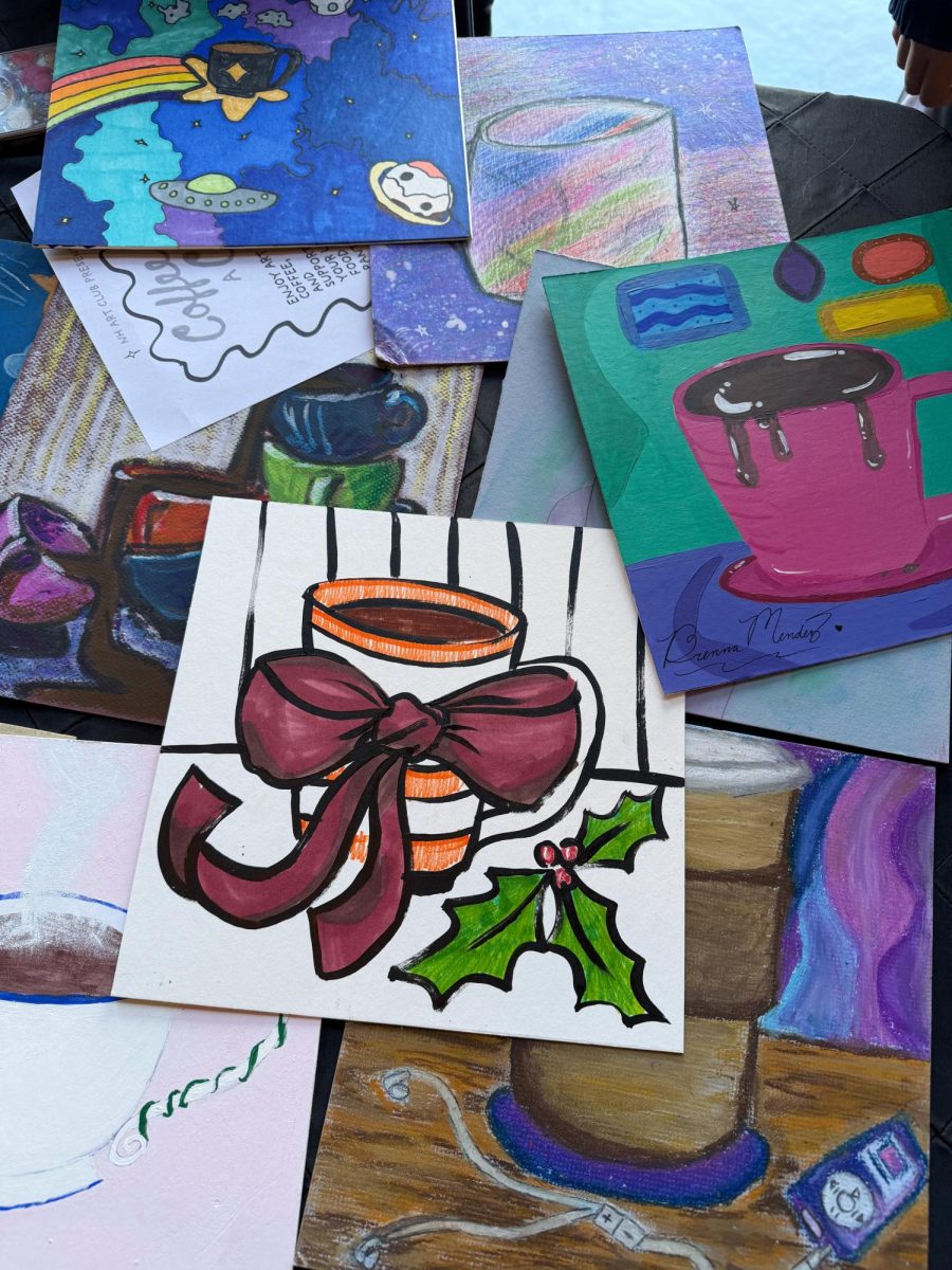 A collection of student artwork displayed at the fundraiser.