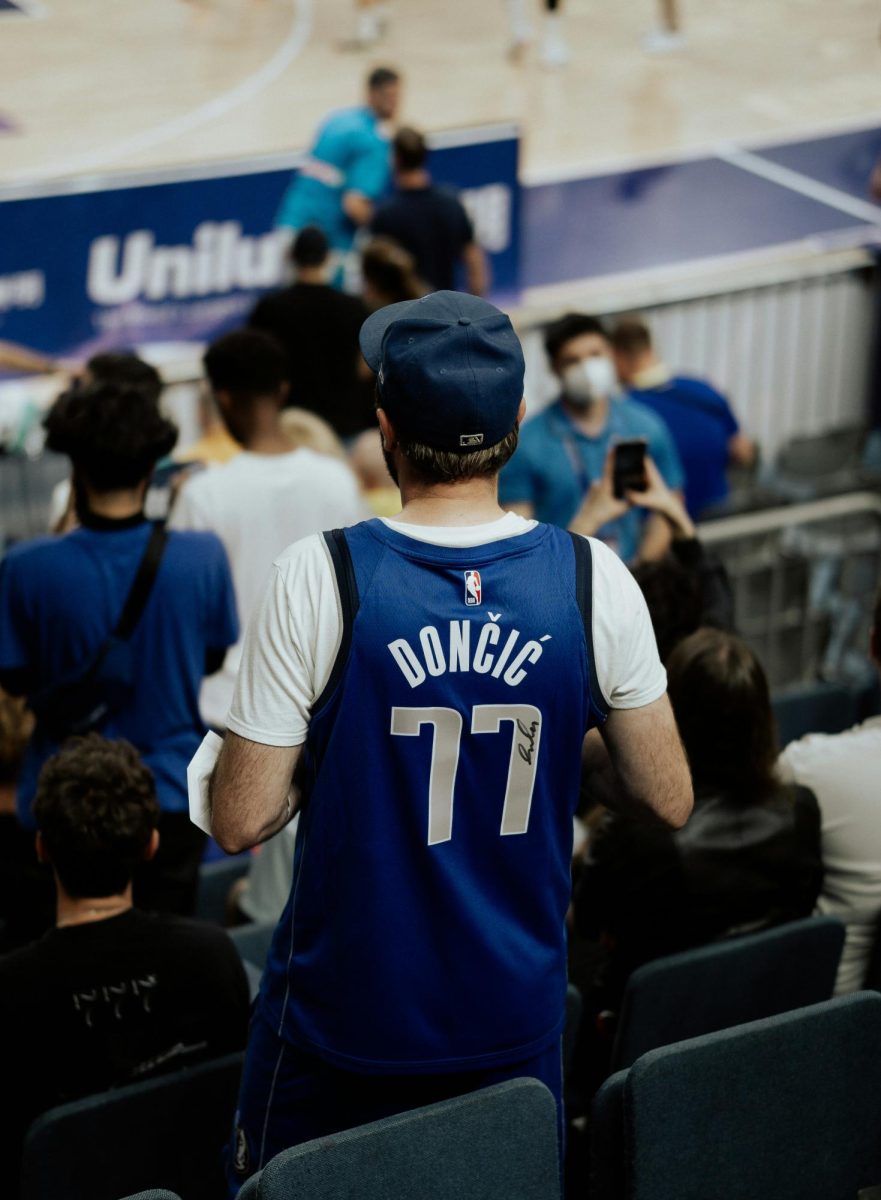 Photo of a man wearing a blue jersey used with permission from Unsplash.