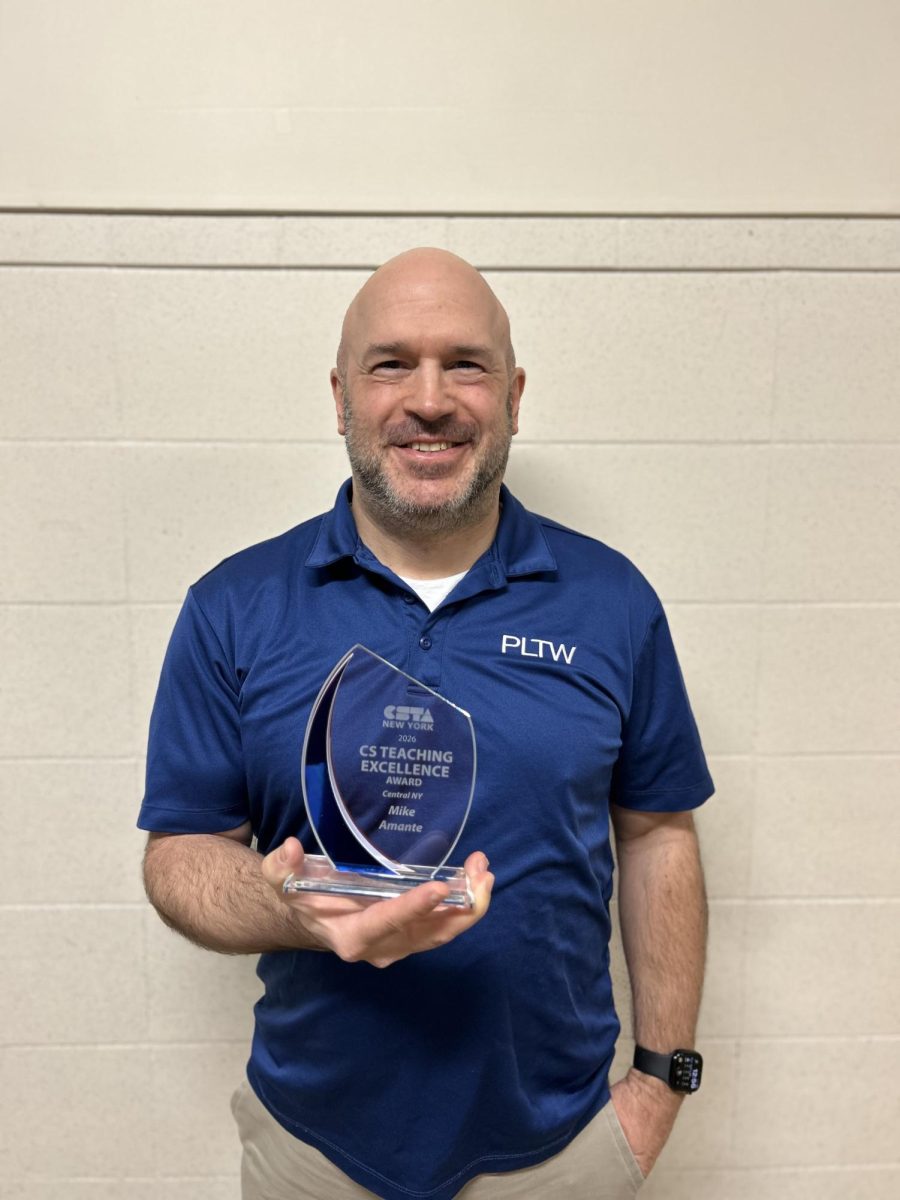 Mr. Amante poses with CSTE Award.  Photo submitted by Mr. Amante. 