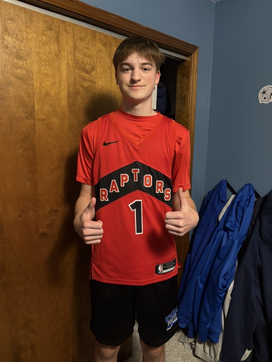 Luke Taylor wearing NBA jersey
